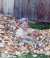 B-Man_&_Daddy_in_fall_leaves_01-2.jpg (799868 bytes)