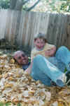 B-Man_&_Daddy_in_fall_leaves_01.jpg (411386 bytes)